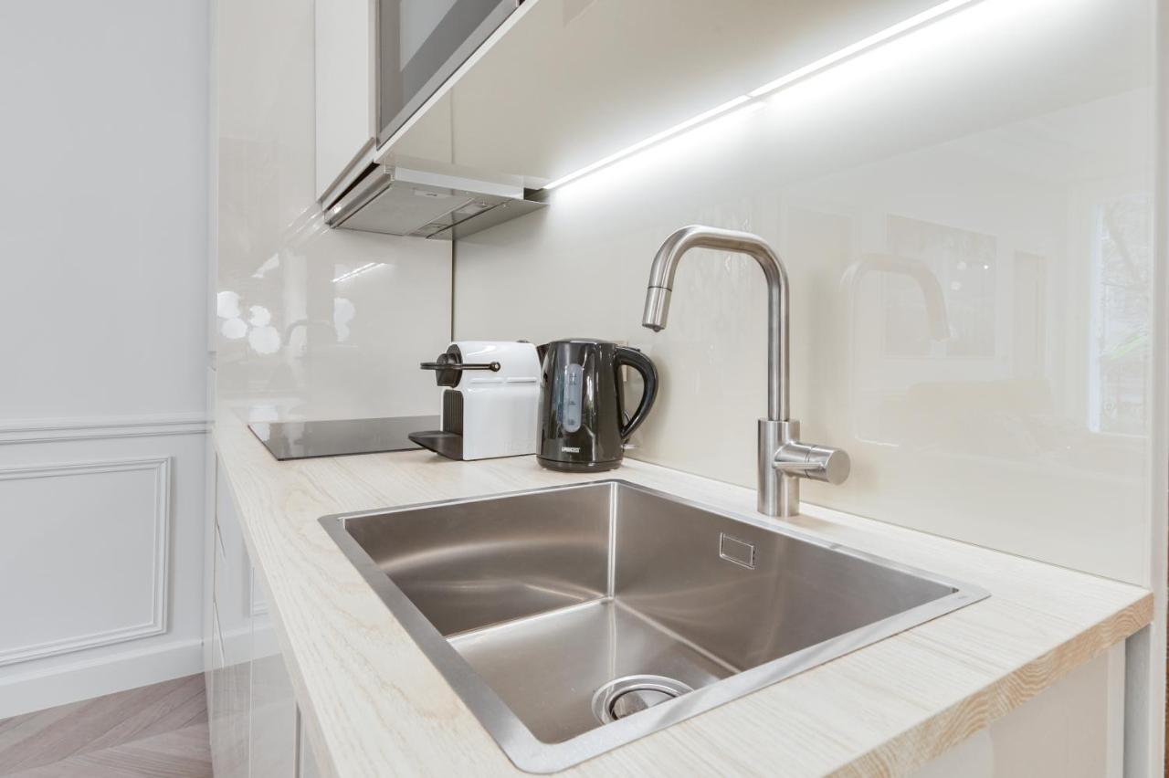 Stylish 2Bd House In Central Paris By Guestready Apartment Bagian luar foto